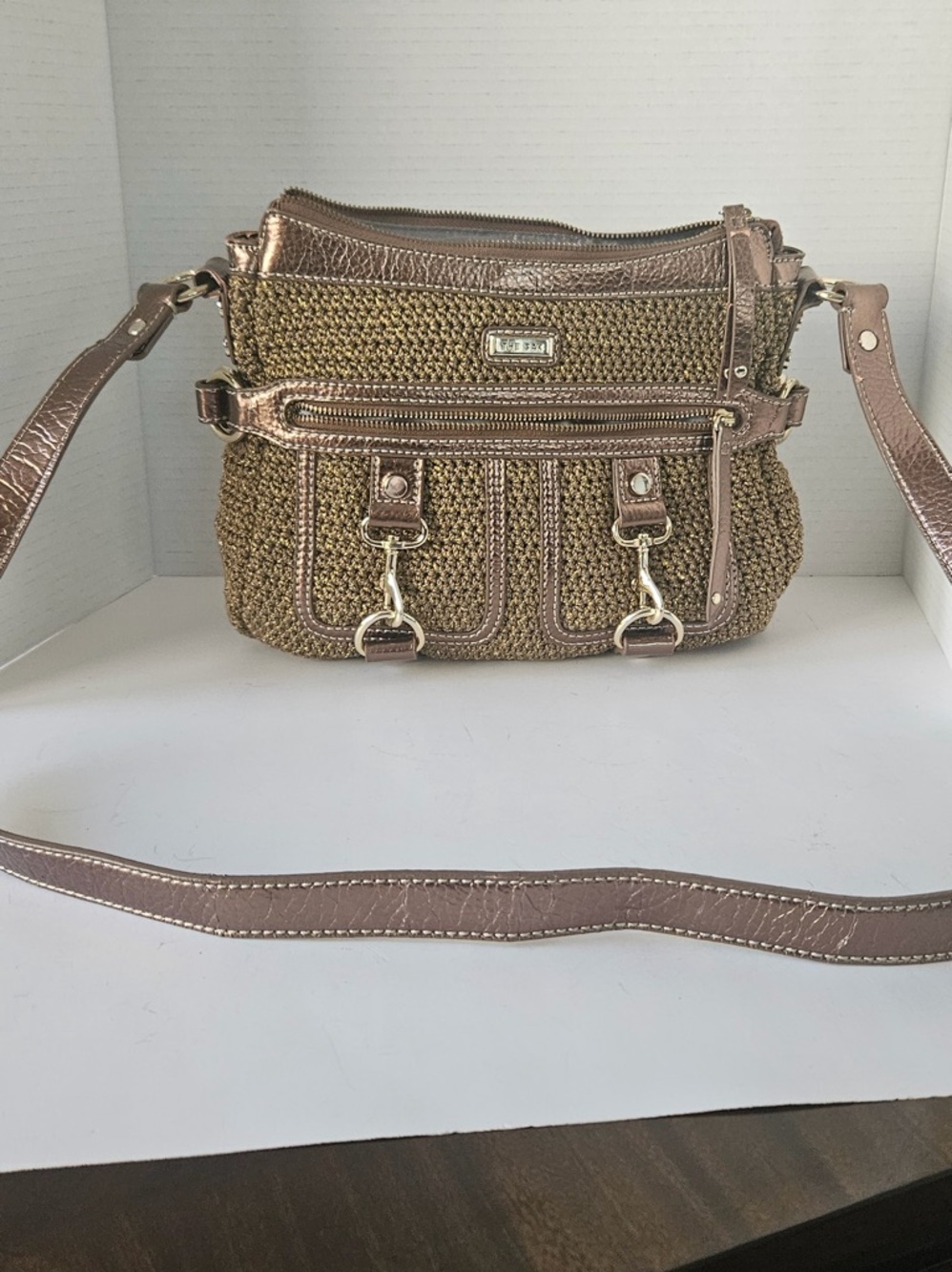 The Sak metallic bronze crochet shoulder bag